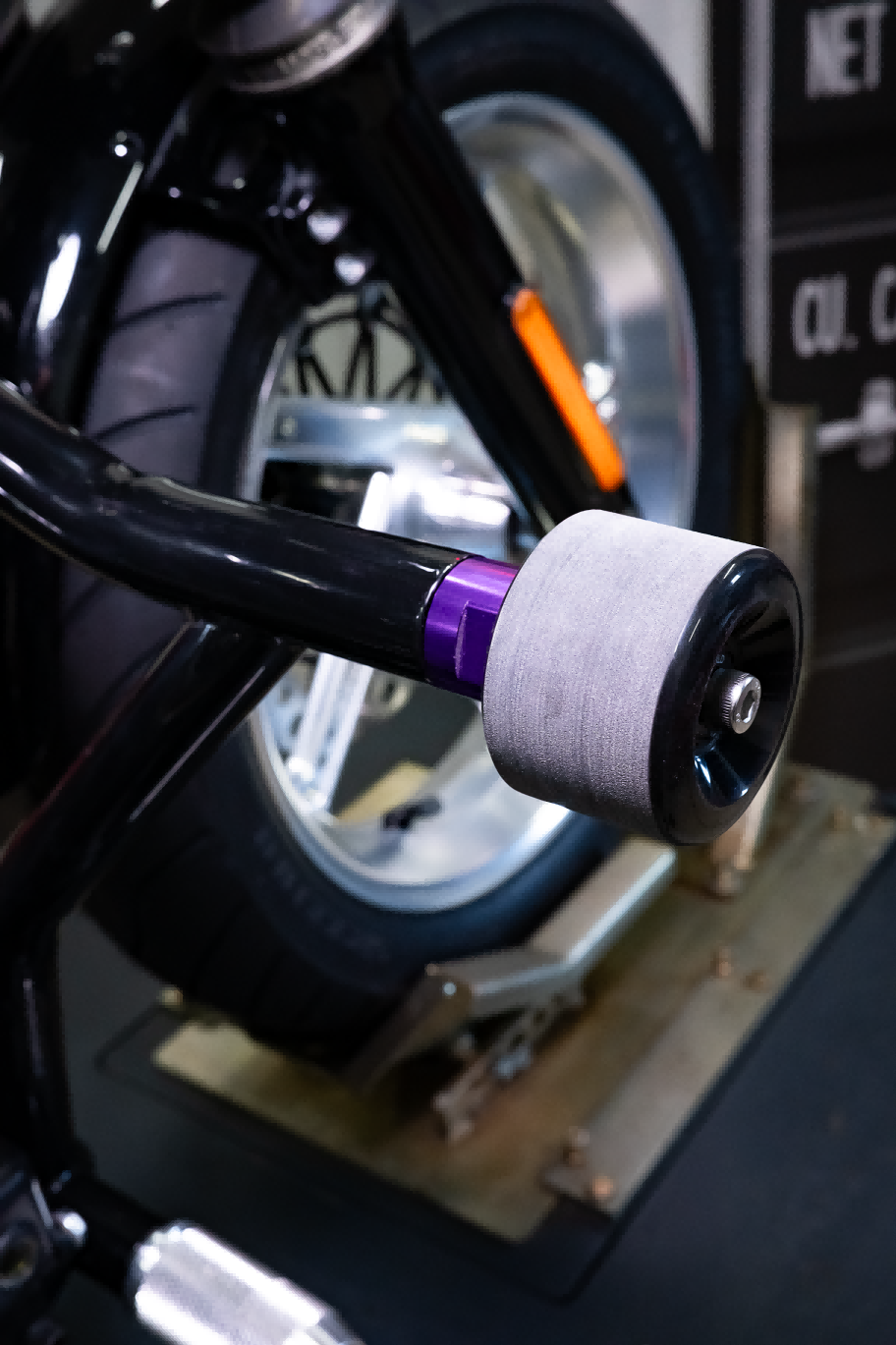 crashbar slider wheels for Harley-Davidson, purple, installed