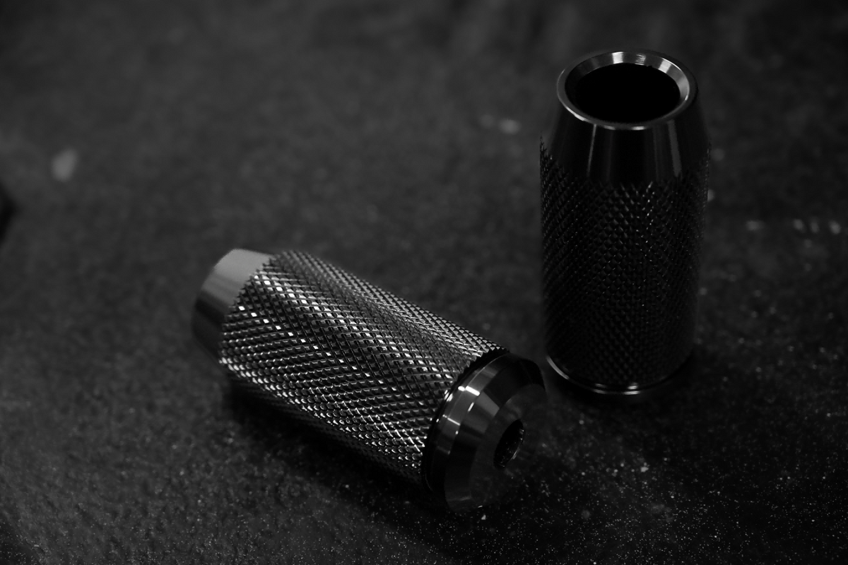 CNC crashbar sliders for Harley-Davidson, black pair