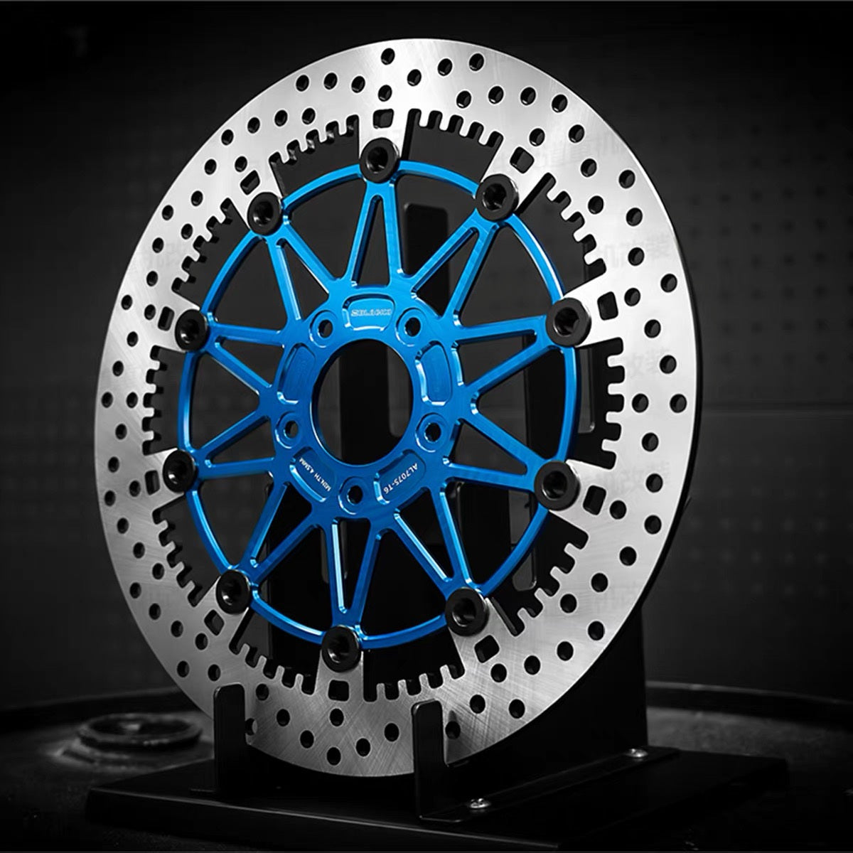 Black3 floating brake rotor for Harley-Davidson, blue anodized carrier, three-quarter view