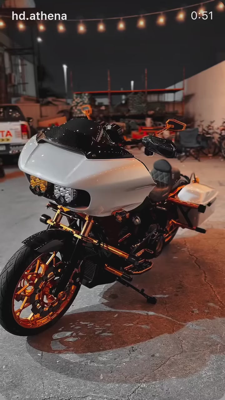 White custom Harley-Davidson bagger on Black3 gold billet wheels